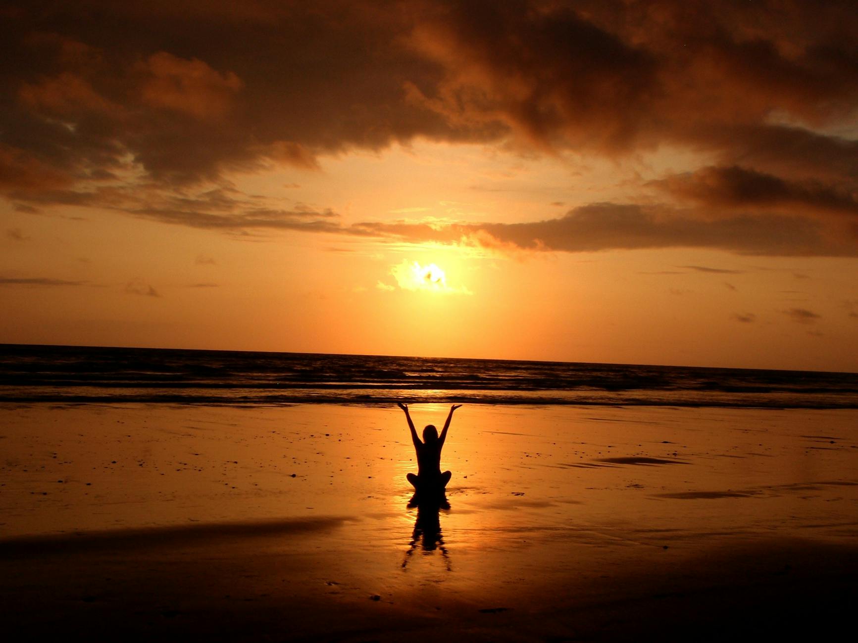 silhouette of person raising its hand